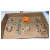 Womanï¿½s costume jewelry bracelets , necklaces and