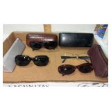 Prescription womanï¿½s sunglasses with cases and