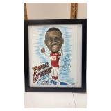 Framed  and signed caricature artwork depicts