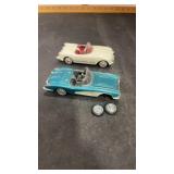 2 Diecast Corvette Cars.  1 has 2 Broken off