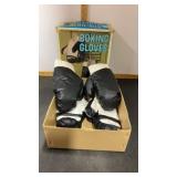 Pair of kids Sparing Boxing Gloves show wear.