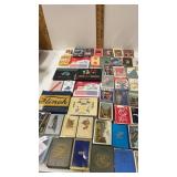 Assortment of playing cards some are sealed in