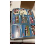 Binder with trading cards.  Race car, campbells