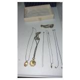 Silver and gold tone necklaces and bracelets
