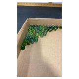 50 Various Marbles.  Mainly Green