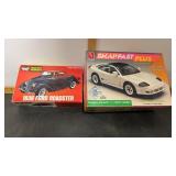2 plastic models.  Not all pieces are there