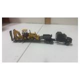 1/87 scale semi truck and trailer.And John Deere