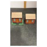 2 Cabins made out of a solid piece of wood.  I