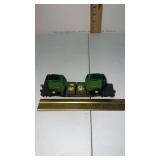 John Deere round baler s on a flat bed HO scale
