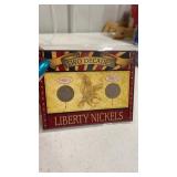 Two decades.  Liberty nickels 1900 and 1910  with