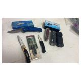 Leatherman and 5 pocket knives