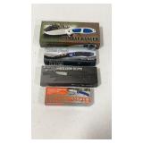 4 Folding Knives in boxes
