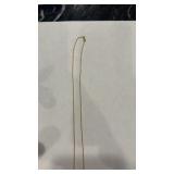 2.8 g of 14 K rope neck necklace