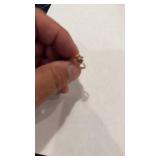 1.8 g 10 karat ring with garnets
