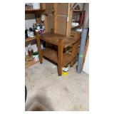 Homemade wood two shelf cabinet on casters