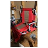Two folding stadium chairs