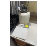 Kitchen utensils in ceramic jar, Timer, Towel, &