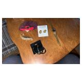 Gold tone brooch , watch , earrings  and more