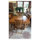 Wood table on casters with 4 chairs  44 x 44