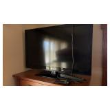 LG tv Approx 46"w/ remotes & surge protector