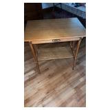 Wooden side table on casters approximately  20.5