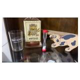 Tin matchbox holder, advertising juice glass and