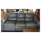 Tan. Matching couch , loveseat and recliner  on