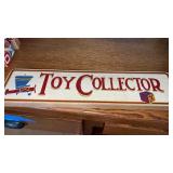 Wooden toy collector sign