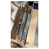 Group of long Pipe style Clamps