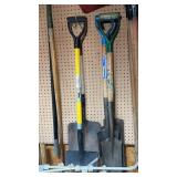 Group of shovels,  pitch forks and spades