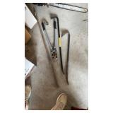 Two pry bars and a bolt cutter