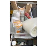 Box of plastic drop cloth and paper