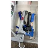 Four caulking guns one large 13 1 quart caulking