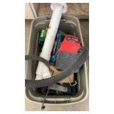Tote with shop vac caulking gun and more