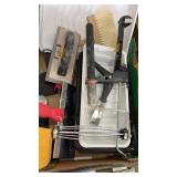 Box of painting supplies and rollers