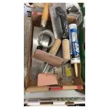 Box of trowels tube of caulking