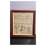 Framed Antique needle work sampler signed. 13 x