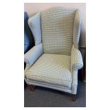 Wingback armchair upholstered in blue and yellow