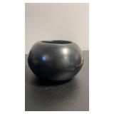 Polished plain black wear bowl signed