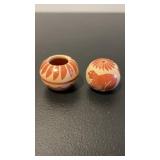red ware pottery seed jar signed by artist KWA