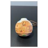 Hand painted clay ornament cliff dwellings and