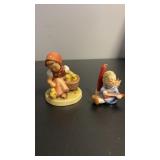 Goebel M.J. Hummel figurines  Little girl feeding
