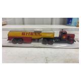 Diecast model of a Mack semi truck with a shell