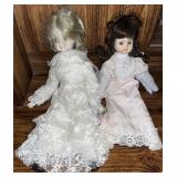 C 1980 Pair of Porcelain Dolls w/ Dress