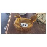 AMBER COLORED GLASS HEN ON NEST