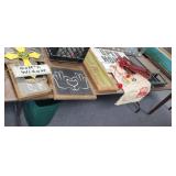 TABLE FULL *SIGNS, CHRISTMAS GOODIES, HANGING RACK