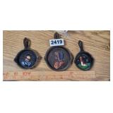 (3) CAST IRON WALL HANGER SKILLETS