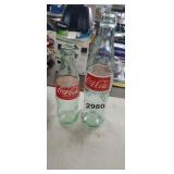 (2) COKE BOTTLES