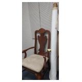 CHAIR WITH  A ROLL OF FABRIC