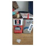 (2) OIL CAN, 1 IS EMPTY, 1 IS 1/2 FULL